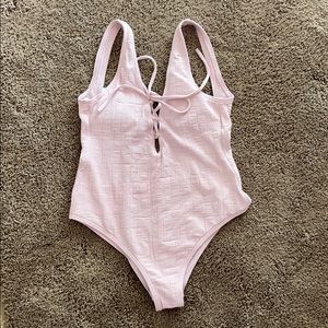 Billabong light pink one piece in EUC